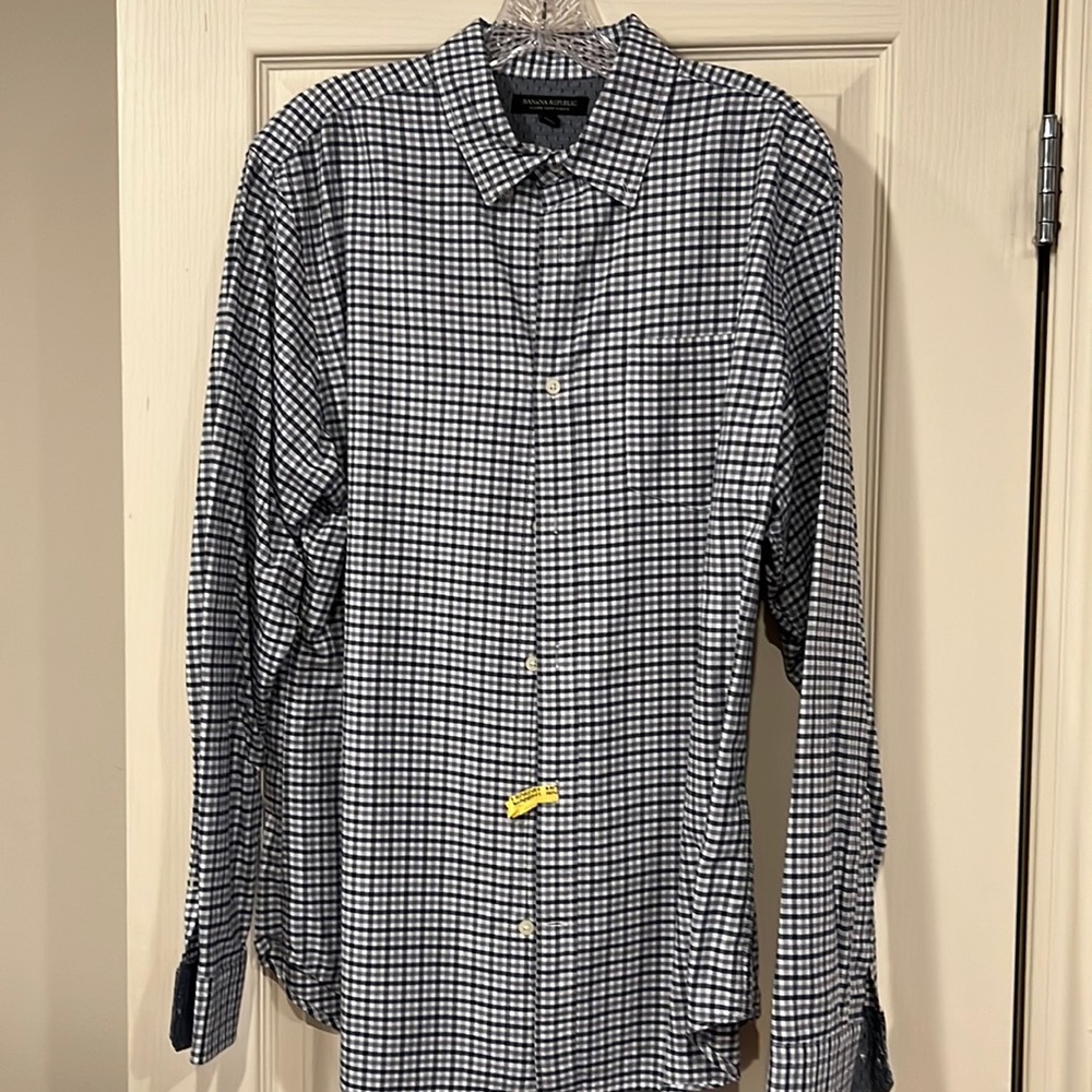 Barely worn plaid shirt in size L